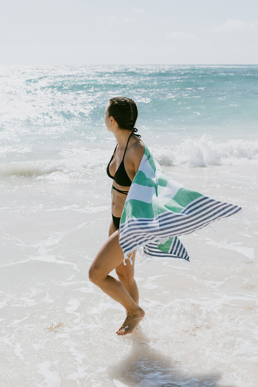 A_woman_on_the_beach_with_her_