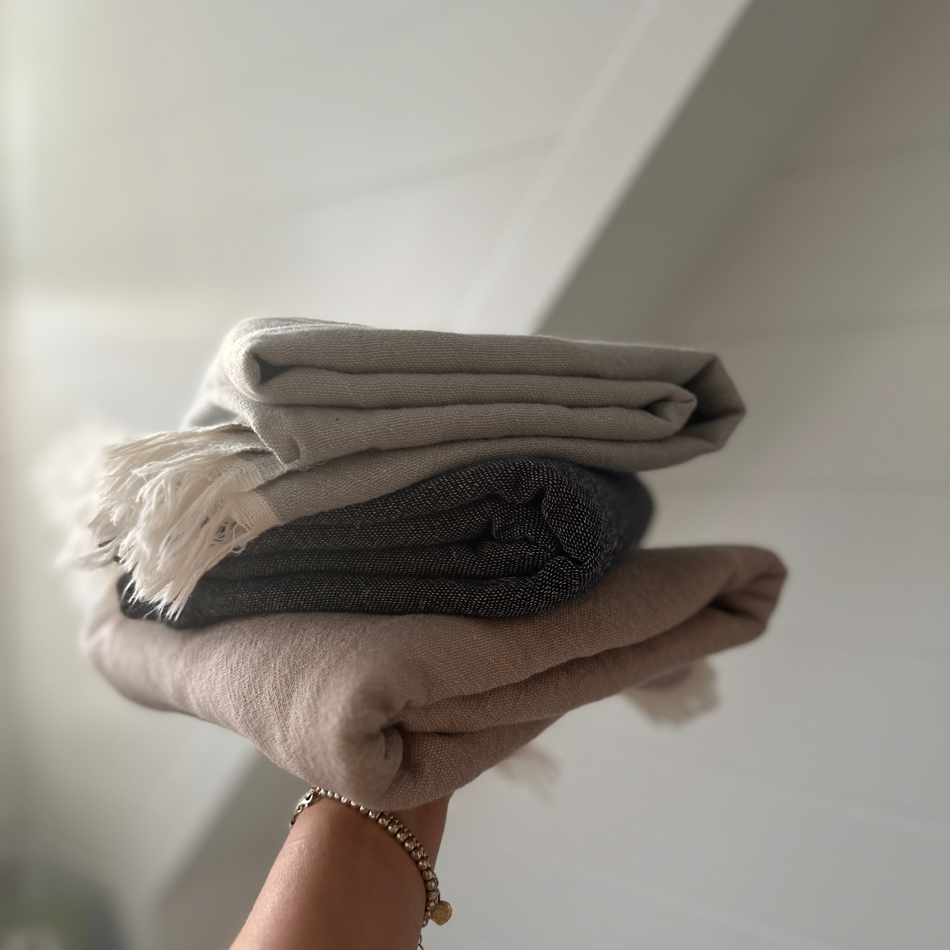 Napoli towels folded – bamboo and cotton blend with natural tones