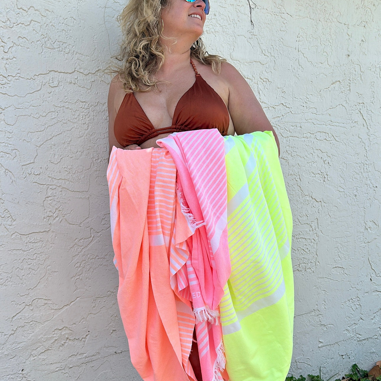 Bonbon towel in coral, lime, and pink – made from recycled cotton
