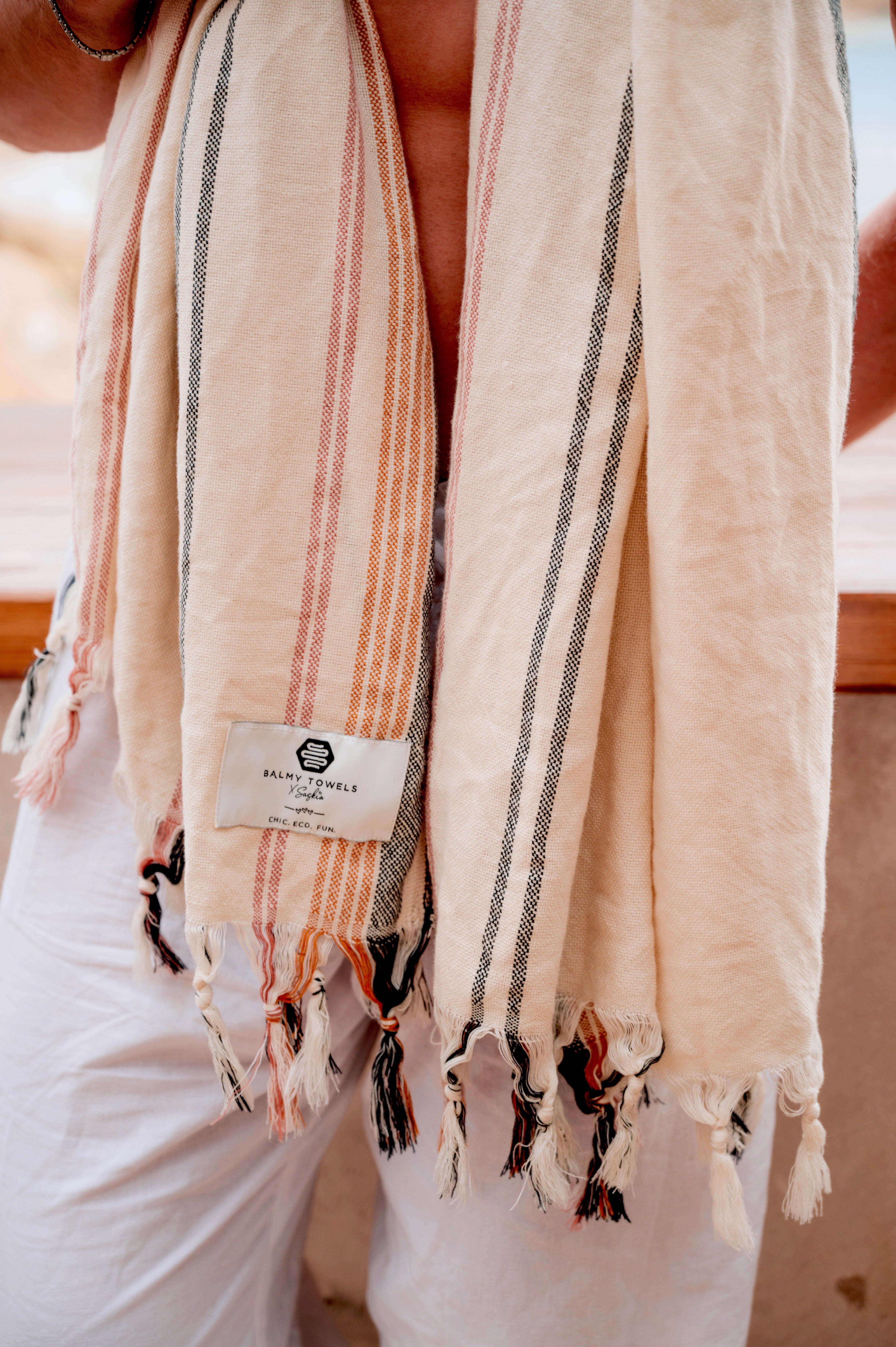 Close-up of NOA towel texture with Balmy label, handwoven cotton