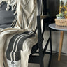 Our Beautiful  Balmy Turin Turin displayed on a chair 