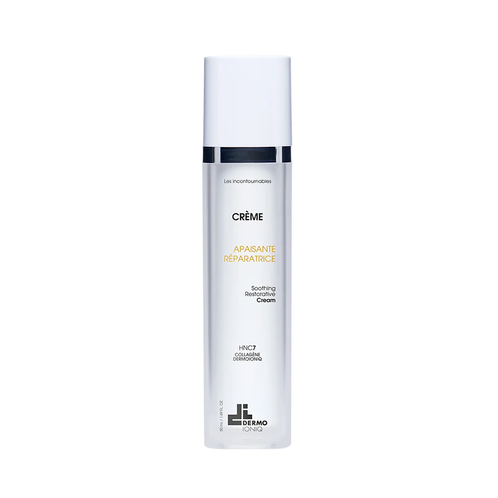 Flacon givré à capuchon blanc et bague marine, Dermo Ioniq Crème Apaisante Réparatrice, lettrage doré, 50 mL