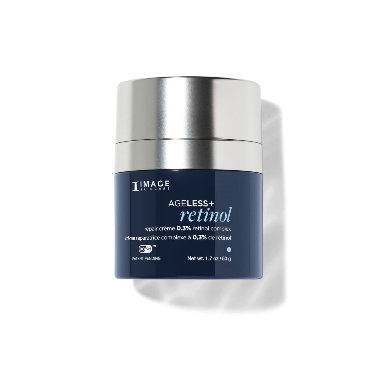 Navy jar with silver lid, Image Skincare AGELESS+ retinol repair crème 0.3%, 50 g, on a white background