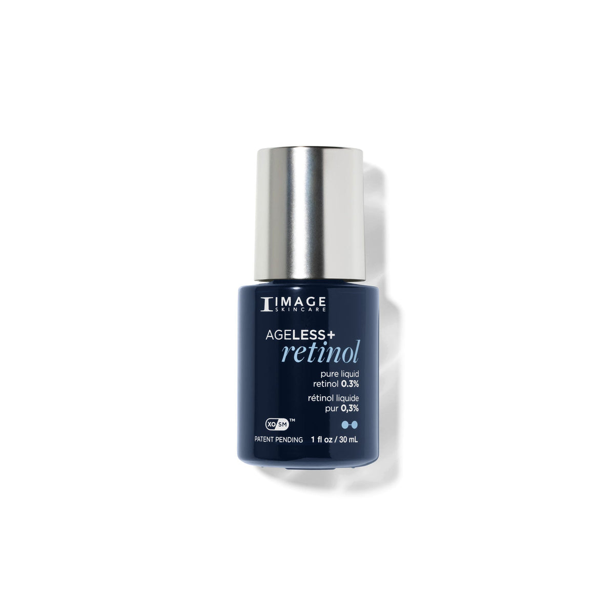 Navy bottle with silver cap, Image Skincare AGELESS+ retinol pure liquid retinol 0.3%, 30 mL, on a white background