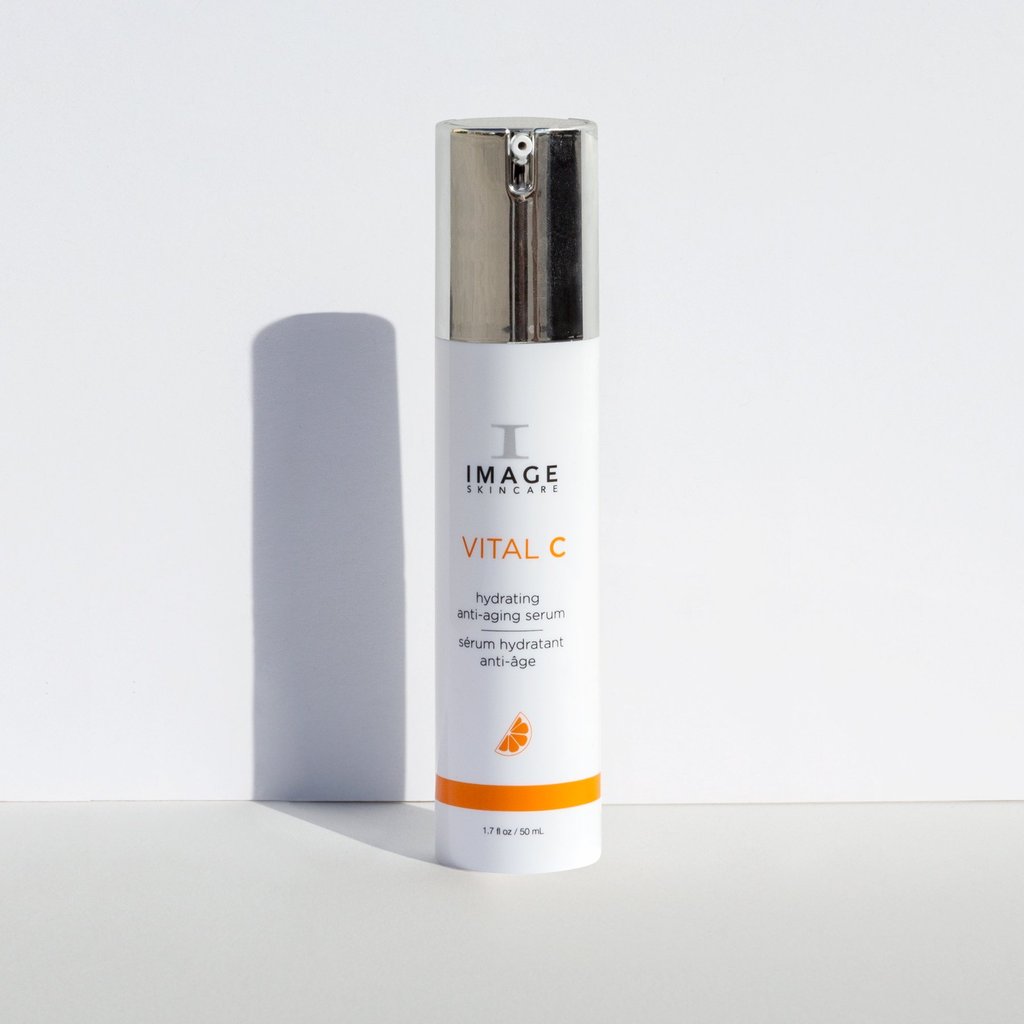 White pump bottle with silver cap, Image Skincare VITAL C hydrating anti-aging serum, 50 mL, on a white background